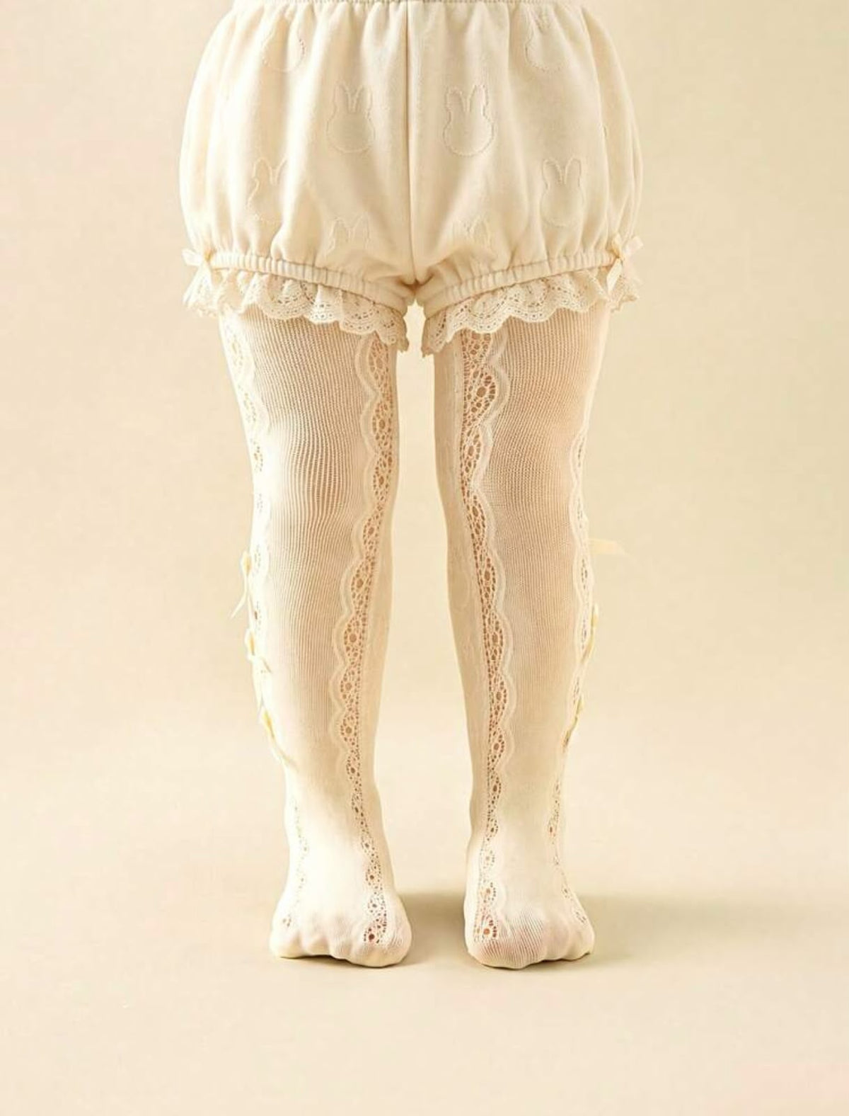 Cream Side Bow Hollow Mesh Tights (1 pc)